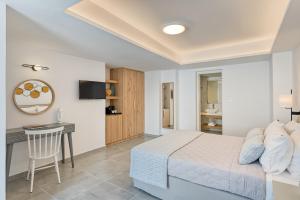 Cama ou camas em um quarto em Lumiére spetses