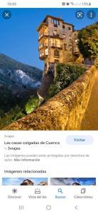 uma página de um site com uma imagem de um castelo em Casa Flor em Arcas