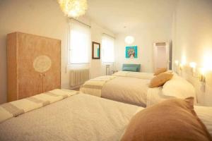 Un pat sau paturi într-o cameră la Guardaviñas62