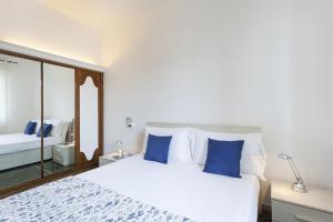 Posteľ alebo postele v izbe v ubytovaní Santa Margherita Apartment in the city center