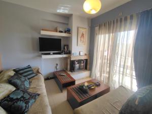 TV a/nebo společenská místnost v ubytování Seaside house