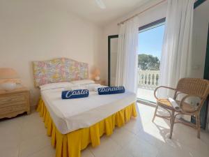 A bed or beds in a room at MILA adosado vistas al mar