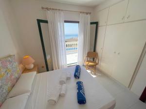 A bed or beds in a room at MILA adosado vistas al mar