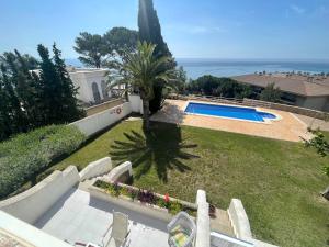 The swimming pool at or close to MILA adosado vistas al mar
