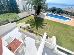 The swimming pool at or close to MILA adosado vistas al mar