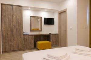 TV a/nebo společenská místnost v ubytování Kuburi Hotel