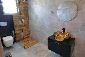 Koupelna v ubytování Kuburi Hotel