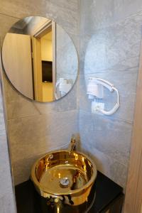 Koupelna v ubytování Kuburi Hotel
