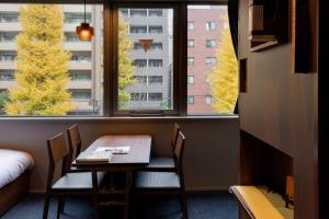 Posezení v ubytování COCOSHUKU Shinjuku-Hanazono