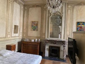 Posteľ alebo postele v izbe v ubytovaní Hôtel du marquis De Broc