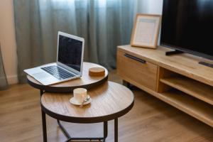 Televízia a/alebo spoločenská miestnosť v ubytovaní Bravissimo Gerió, 2-bedroom apartment