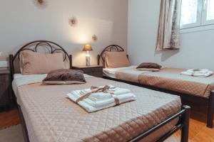 Posteľ alebo postele v izbe v ubytovaní Home Sweet Home Prevezas
