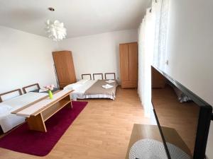 Postel nebo postele na pokoji v ubytování Apartments Rudi