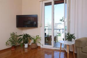 A television and/or entertainment centre at Luccil's Home Downtown