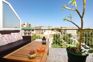 A balcony or terrace at Luccil's Home Downtown