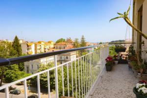 A balcony or terrace at Luccil's Home Downtown