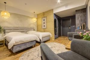Olimp Hotel客房内的一张或多张床位