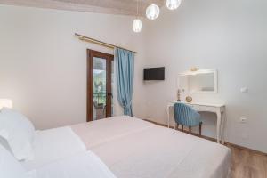 Posteľ alebo postele v izbe v ubytovaní Vincenzo Suites