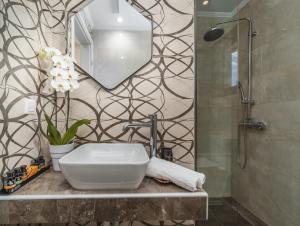 Kúpeľňa v ubytovaní Vincenzo Suites + 37 fotografií