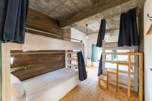 Letto o letti in una camera di Ichi The Hostel