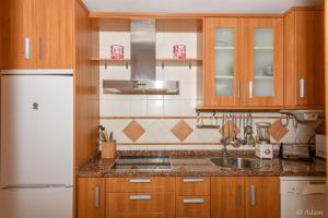Kuchyňa alebo kuchynka v ubytovaní Precioso apartamento en Málaga al lado de la playa