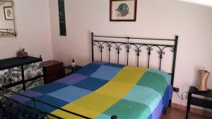 Postel nebo postele na pokoji v ubytování La Mansarda + 9 fotografií