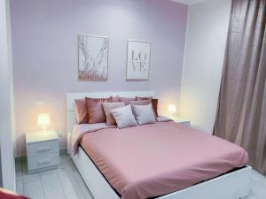 Een bed of bedden in een kamer bij B&B VMHome