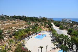 Bazén v ubytování Corfu Hotel nebo v jeho okolí