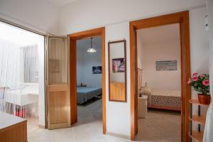 Ένα ή περισσότερα κρεβάτια σε δωμάτιο στο Casa Giardino