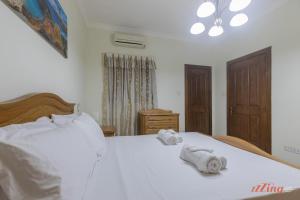 Katil atau katil-katil dalam bilik di Seafront 2 Bedroom Apartment overlooking Bay