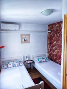 Postel nebo postele na pokoji v ubytování Hostel Miran Mostar