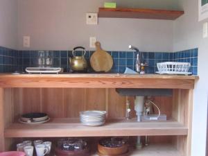 Kuchyň nebo kuchyňský kout v ubytování ビーチハウス沼津Beach house numazu ビーチ至近