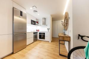 Kuchyňa alebo kuchynka v ubytovaní Bravissimo Tarlà, 2-bedroom apartment