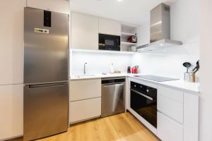 Kuchyňa alebo kuchynka v ubytovaní Bravissimo Tarlà, 2-bedroom apartment