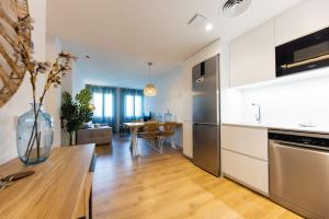 Kuchyňa alebo kuchynka v ubytovaní Bravissimo Tarlà, 2-bedroom apartment