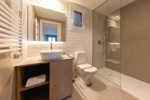 Kúpeľňa v ubytovaní Bravissimo Tarlà, 2-bedroom apartment + 26 fotografií
