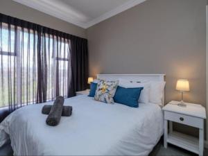 Giường trong phòng chung tại Ocean Pearl Accommodation