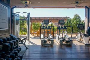 a row of treadmills in a gym at Bardessono Hotel and Spa in Yountville