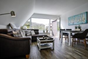 Posezení v ubytování Maison sur Mer ehemals Jodat