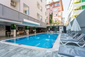 Bazén v ubytování Aslan Sand & City Hotel nebo v jeho okolí