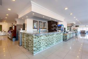The lobby or reception area at Aslan Sand & City Hotel