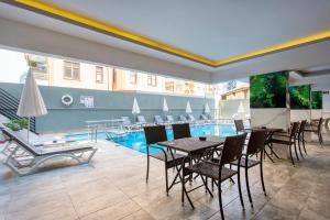 Bazén v ubytování Aslan Sand & City Hotel nebo v jeho okolí