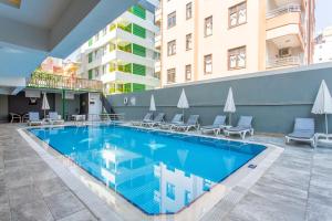 Bazén v ubytování Aslan Sand & City Hotel nebo v jeho okolí