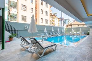 Bazén v ubytování Aslan Sand & City Hotel nebo v jeho okolí