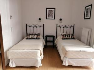 Posteľ alebo postele v izbe v ubytovaní Casa Consell Bailen, Guest House