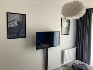 Televízia a/alebo spoločenská miestnosť v ubytovaní LOFT PEARL Basen Taras Apartament
