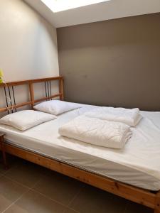 Łóżko lub łóżka w pokoju w obiekcie Maneschijn****