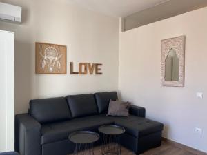 Ein Sitzbereich in der Unterkunft Apartamentos San Miguel