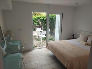 A bed or beds in a room at Cas Catalá Living