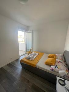 Ein Bett oder Betten in einem Zimmer der Unterkunft Villa Iva Vodice